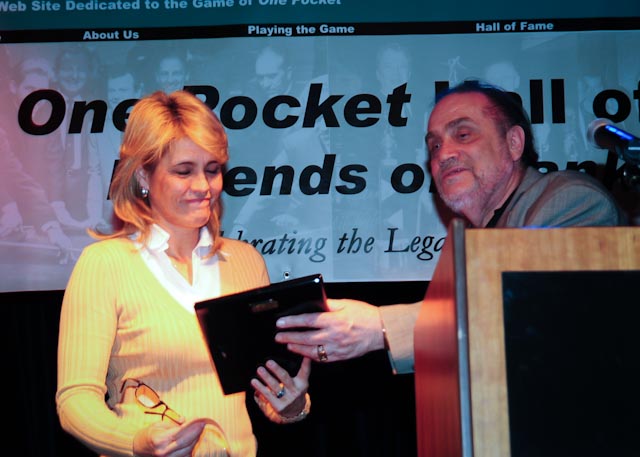 Diane Schmid accepts Wade Crane Lifetime Pool in Action award from Freddy the Beard